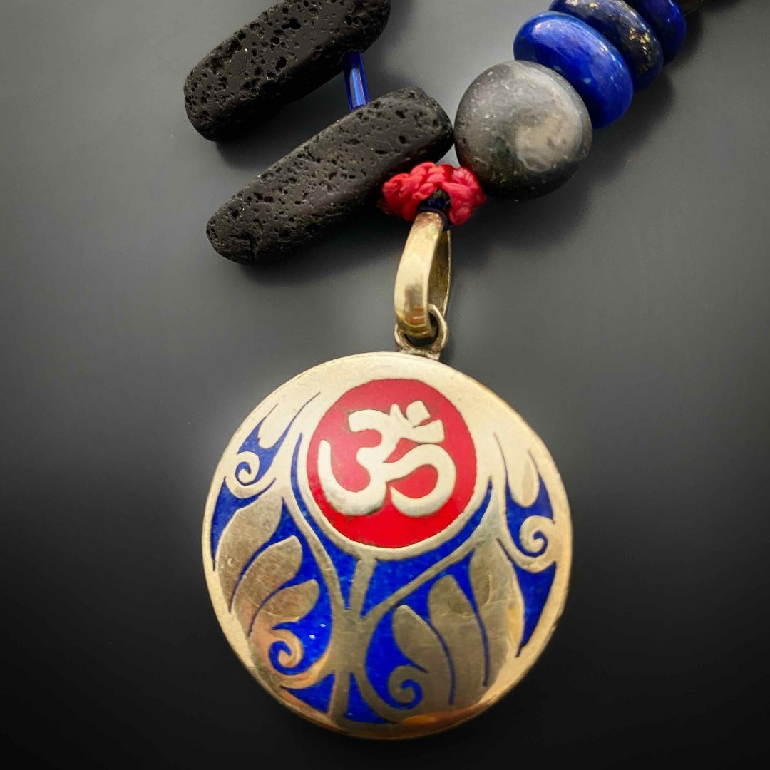 The Tibetan Om Necklace exudes grace and spirituality, as its colorful beads and sacred OM pendant come together in harmony.