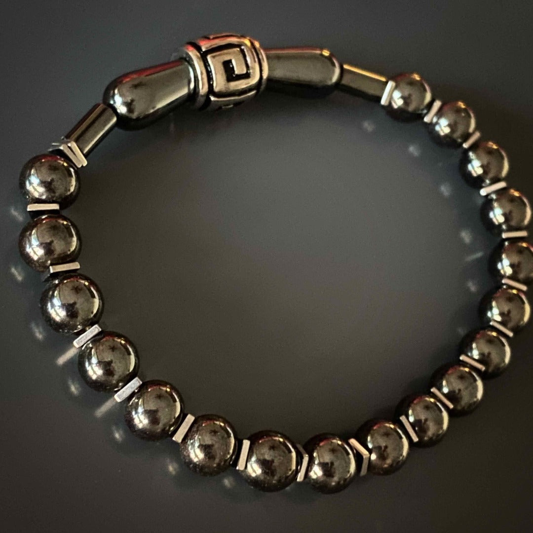 Handmade Bracelet with large grey hematite teardrop beads and tribal accent bead.