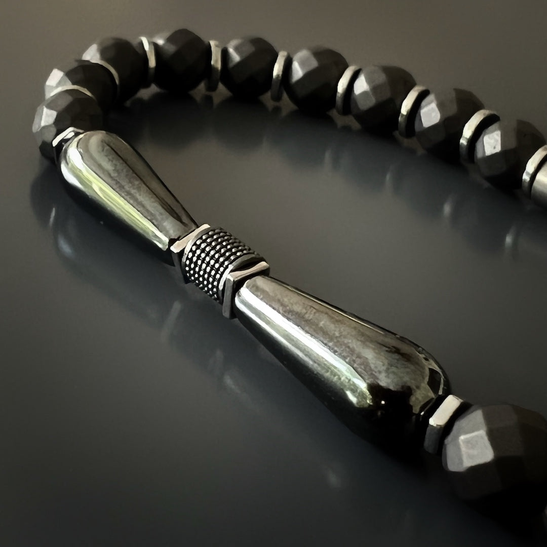 Experience a sense of grounding and harmony with the Hematite Balance Men&#39;s Bracelet, a handmade accessory.