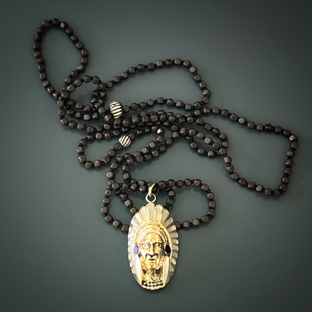 Adorn yourself with the Indian Chief Head Necklace, showcasing a meticulously crafted Chief head pendant symbolizing strength and wisdom.