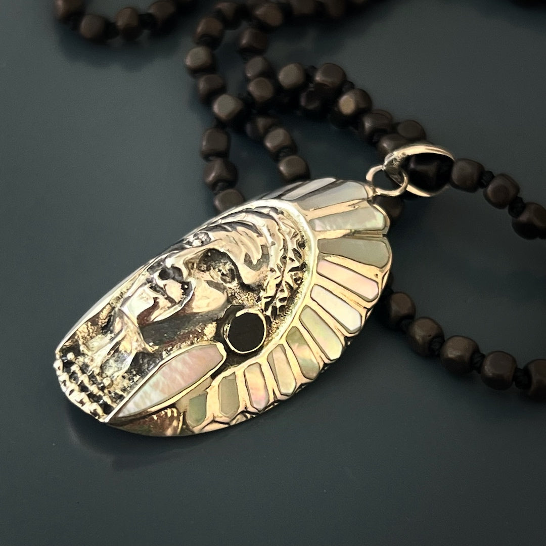 Experience the cultural heritage with the Indian Chief Head Necklace, featuring a stunning Sterling silver pendant on hematite stone beads.