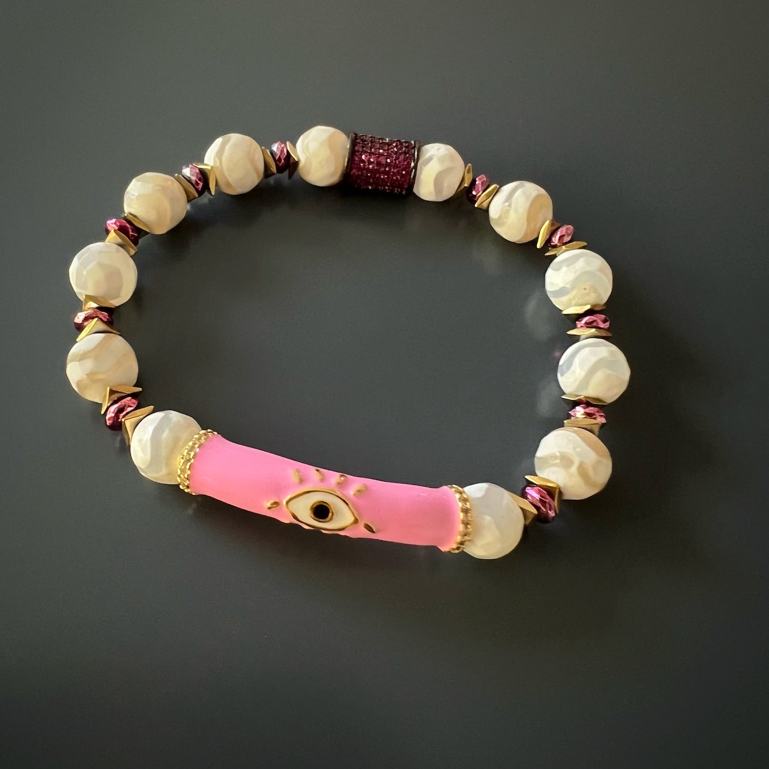 Discover the unique allure of the Love Protection Bracelet, handcrafted with love and adorned with Nepal Agate stones and an enchanting evil eye charm.