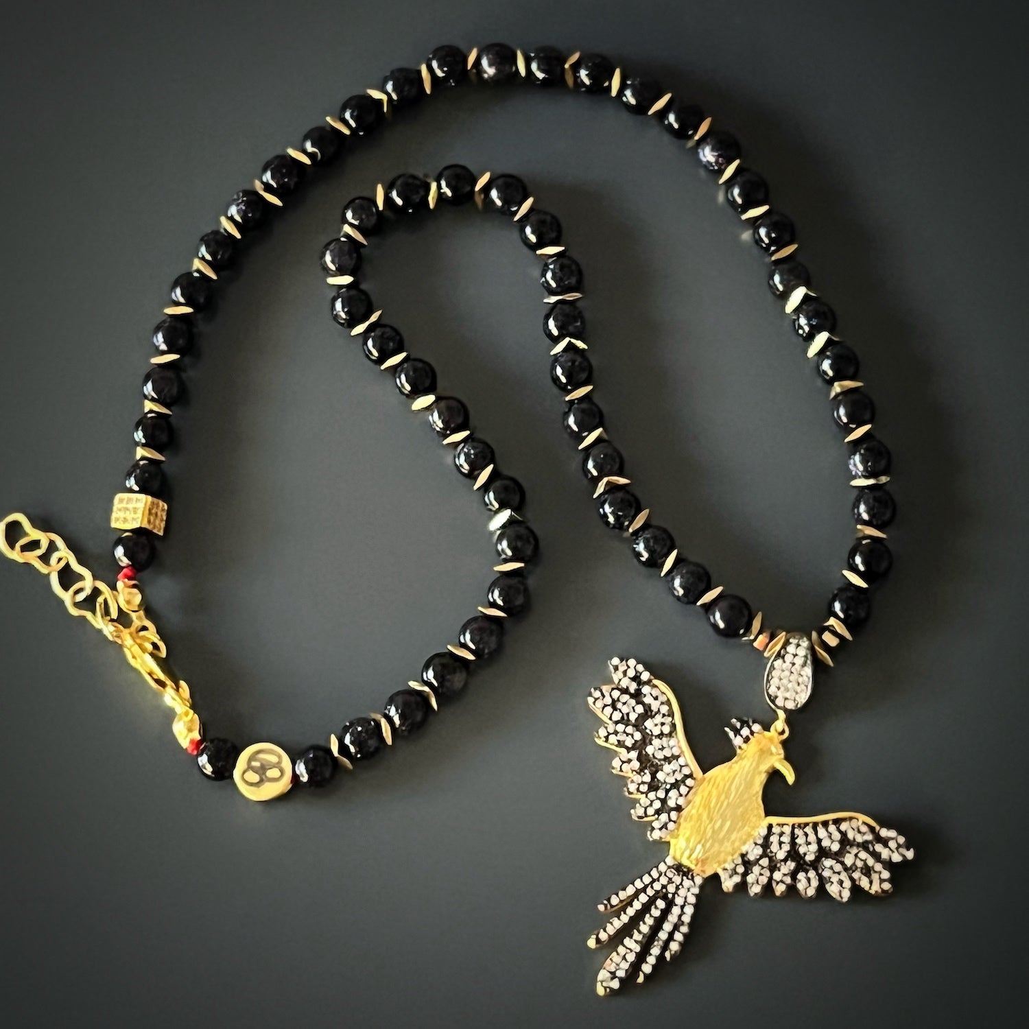 Awaken the spirit of rebirth with the Magical Phoenix Bird Necklace, adorned with elegant star stone beads and a symbolic phoenix pendant.
