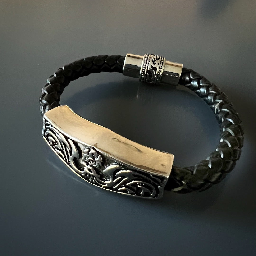Handmade black leather bracelet with stainless steel tribal accents.