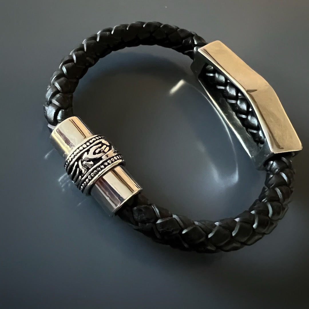 Express your individuality with this striking tribal-inspired leather bracelet.