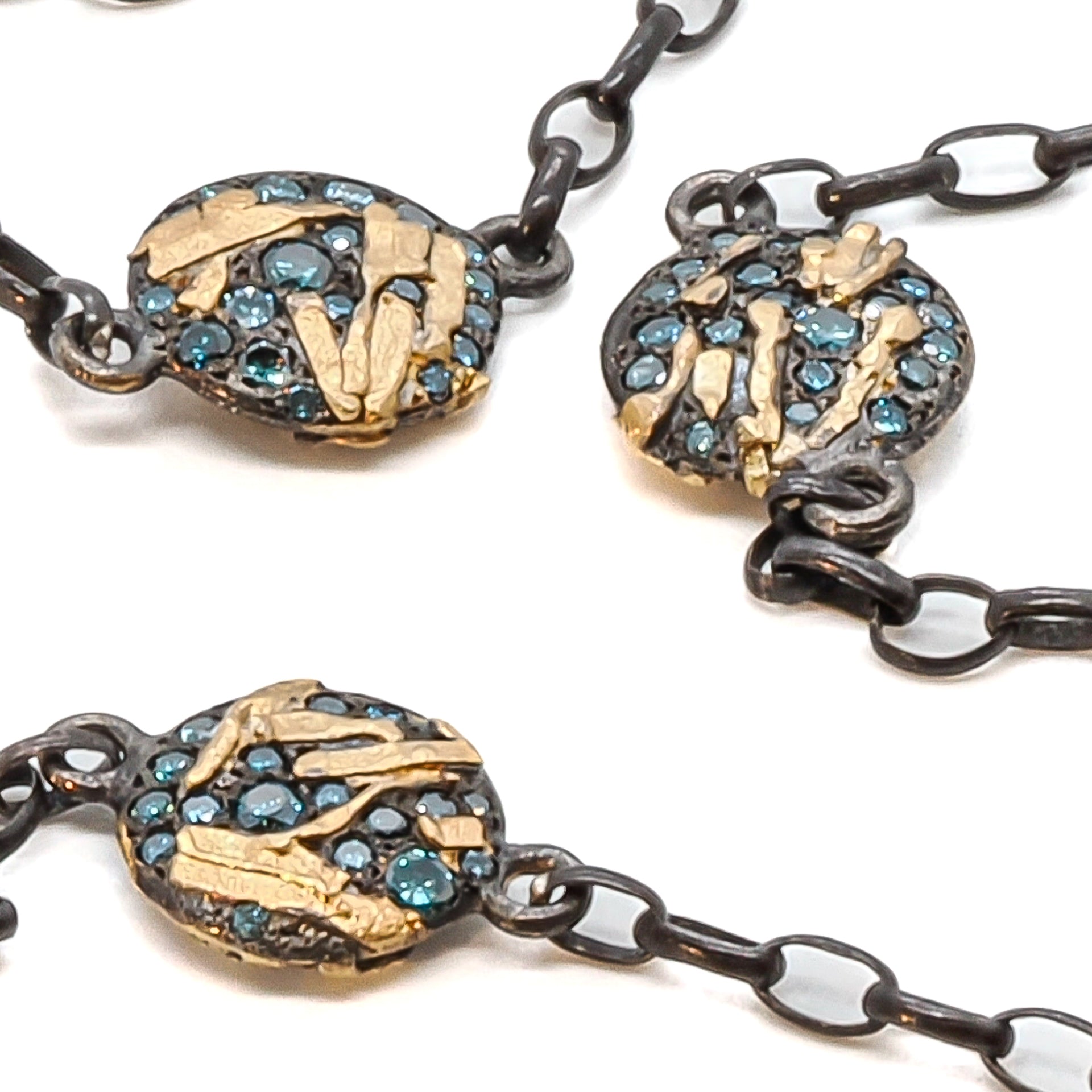 Detailed shot of the round links of the Nature Round Link Necklace, highlighting their luxurious and unique appeal.