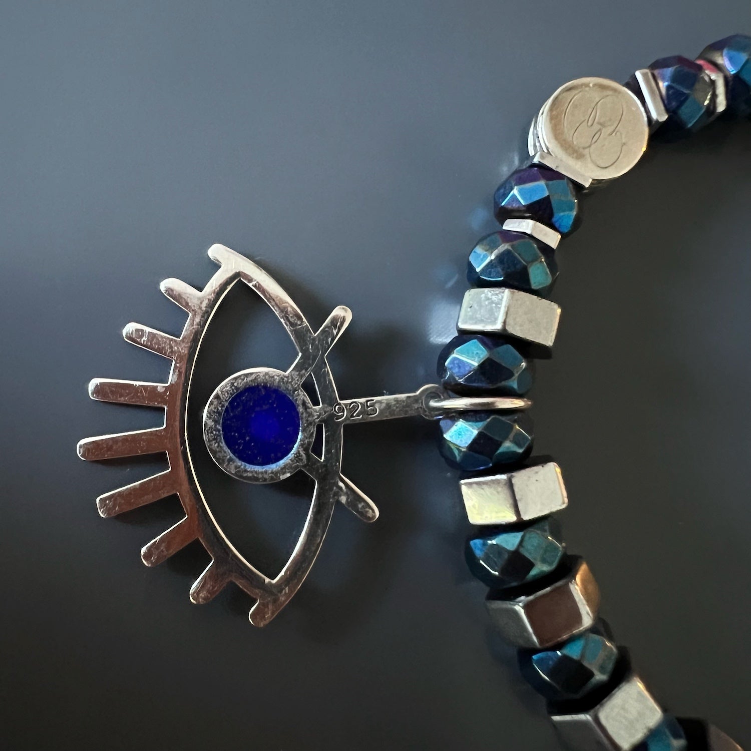 Wear the Nazar Bracelet as a symbol of luck and protection, with its eye-catching sterling silver evil eye charm.