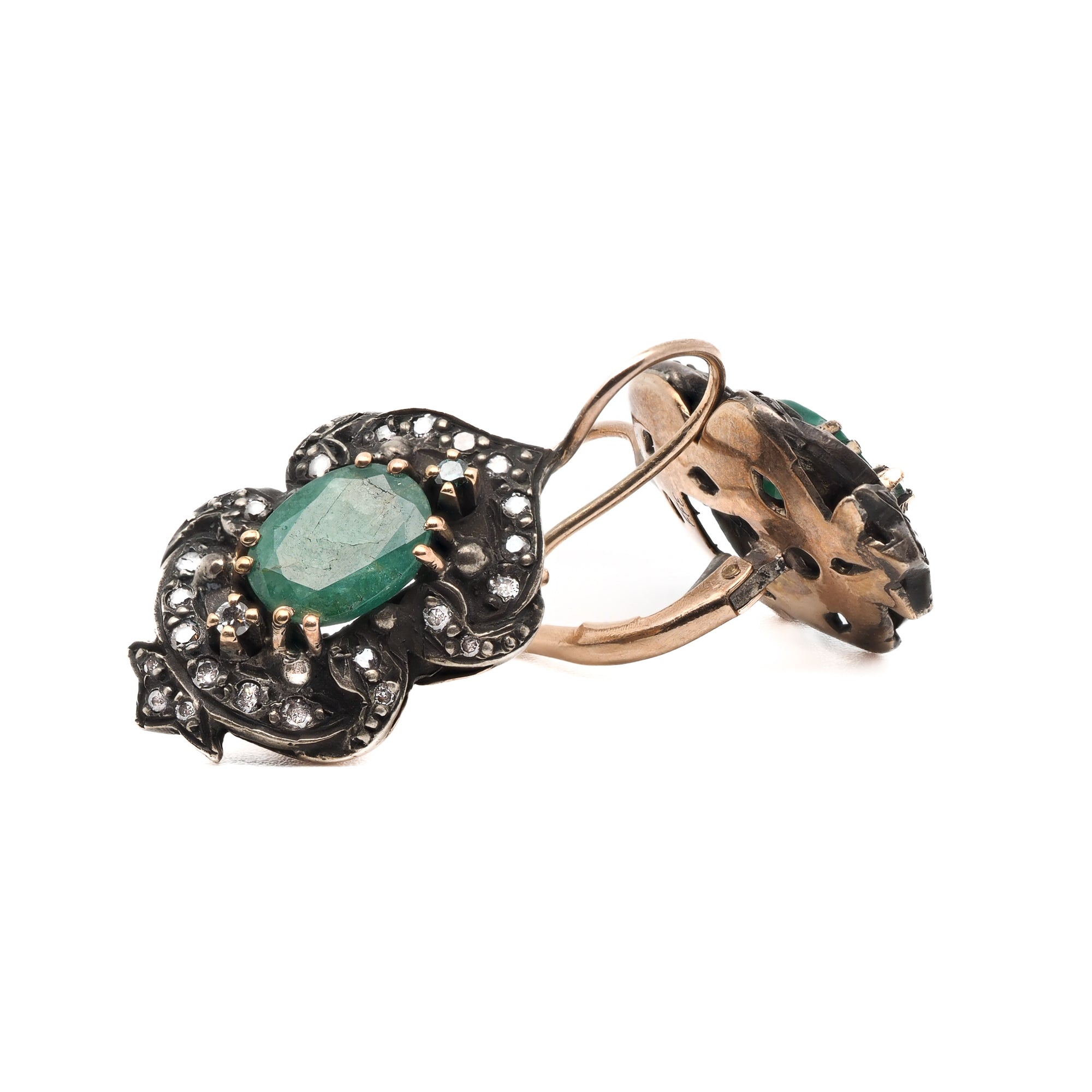 Unique and Elegant - Diamond and Emerald Earrings, a special addition to any look.