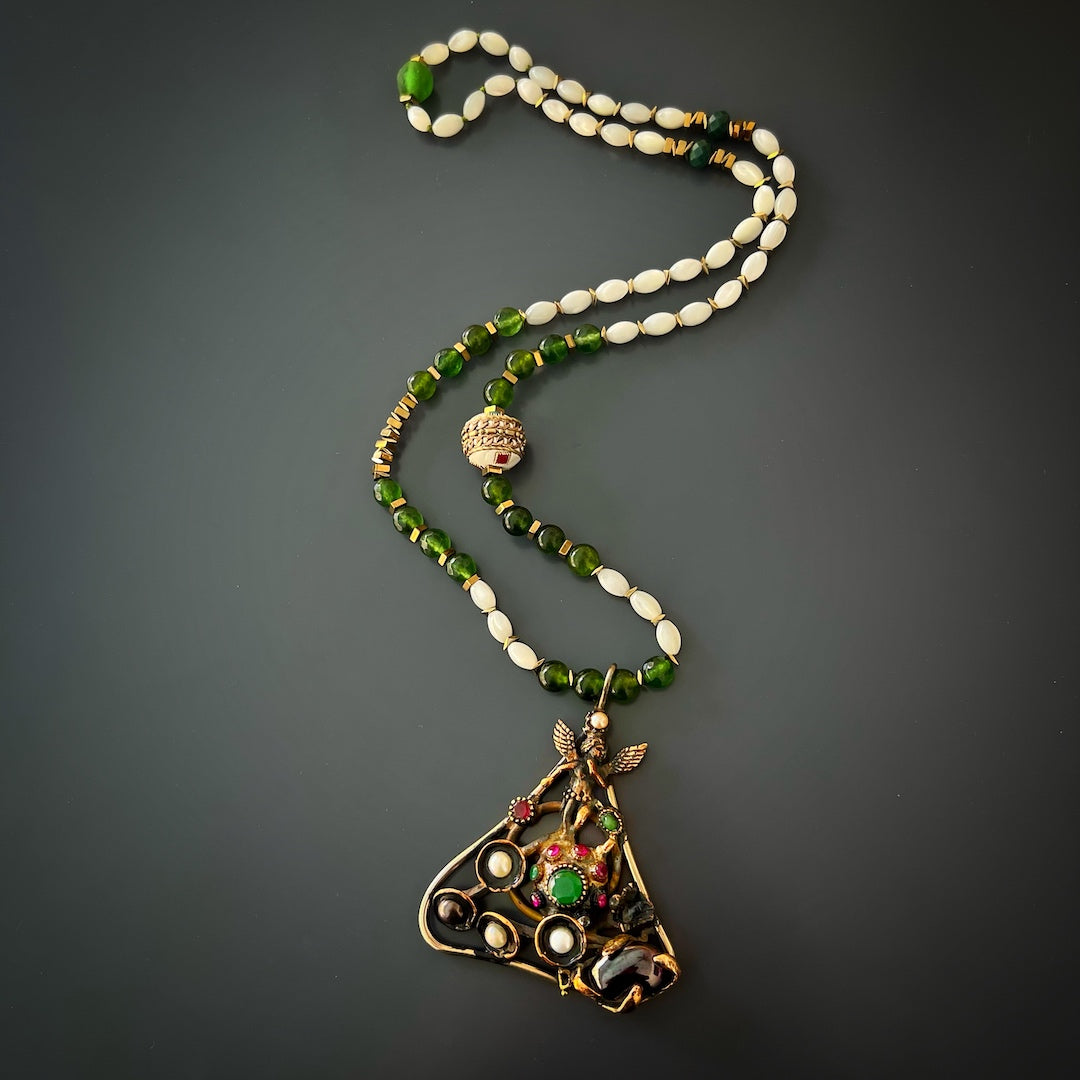 Stylish and Spiritual - The Handmade Necklace Combines Natural Gemstones with a Stunning Angel Pendant.