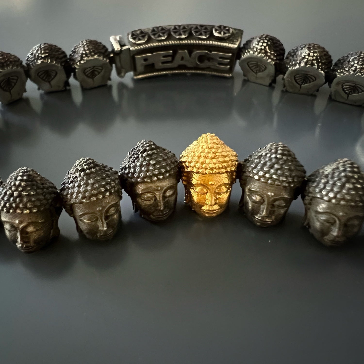 Purity and Luxury - Gold Lotus Silver Buddha Bracelet with Blue Diamonds.