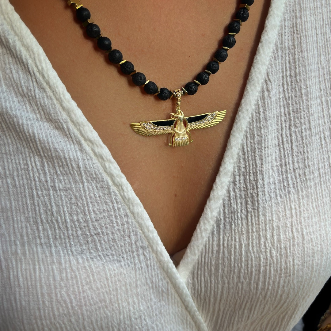 Model wearing the Powerful Faravahar Necklace - Embrace the ancient symbol with style.