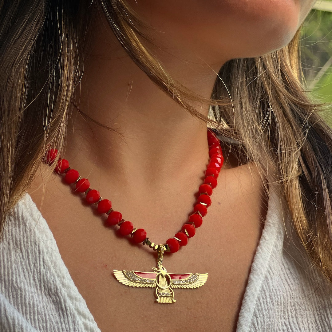 Stylish and Powerful - The Red Crystal Faravahar Necklace Enhances our Model's Look.