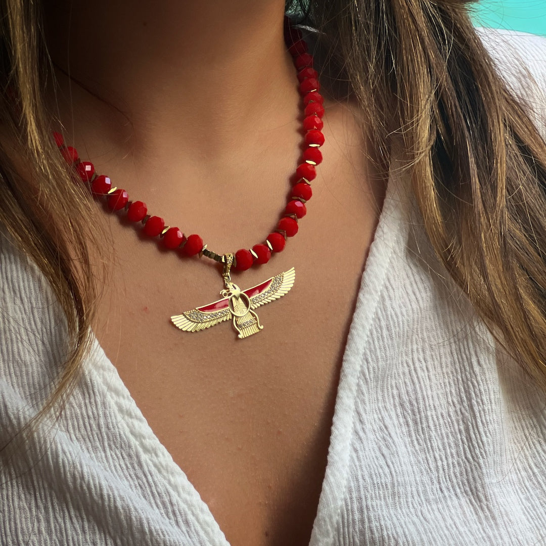 Ancient Inspiration - Our model wearing the captivating Red Crystal Faravahar Necklace.
