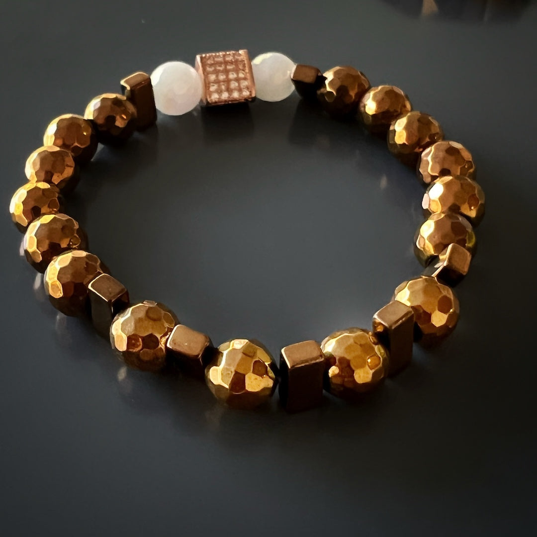 Radiate positivity and love with the Rose Energy Quartz Bracelet Set, showcasing the captivating beauty of rose gold hematite and quartz stones.