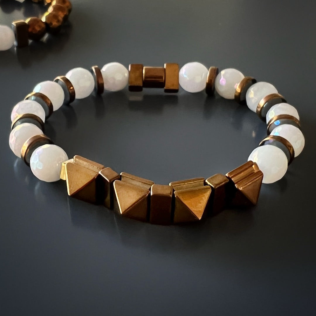 Enhance your energy and well-being with the Rose Energy Quartz Bracelet Set, adorned with rose gold hematite and quartz stones.