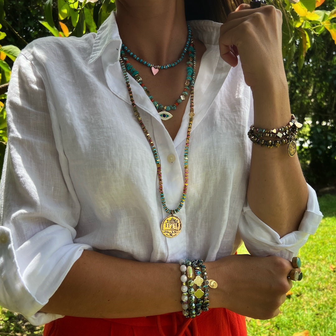 Model adorning the Shamanic Protection Necklace - Exuding Confidence and Spiritual Energy.