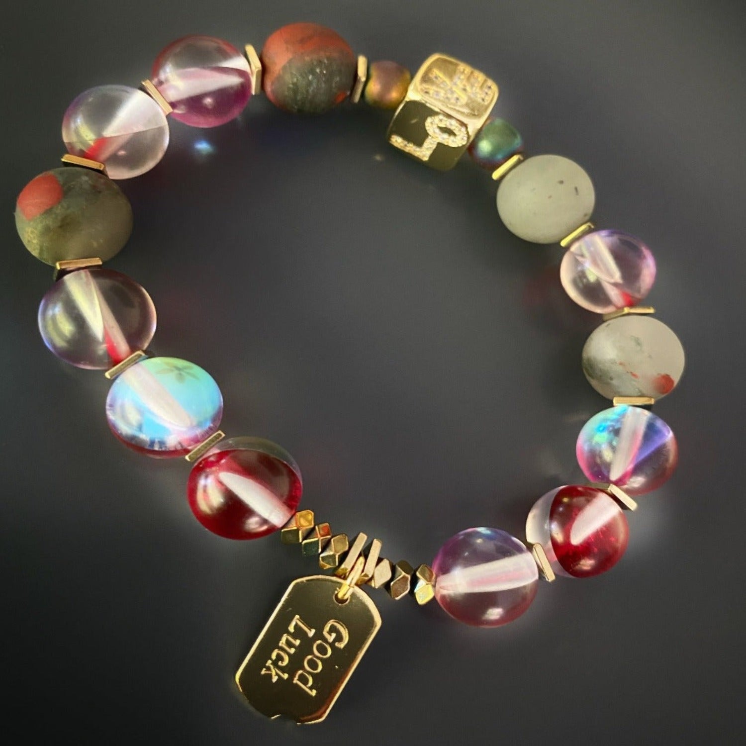 The positive vibes of the Red &amp; Gold Good Luck Bracelet, showcasing its unique blend of colors and meaningful symbolism.