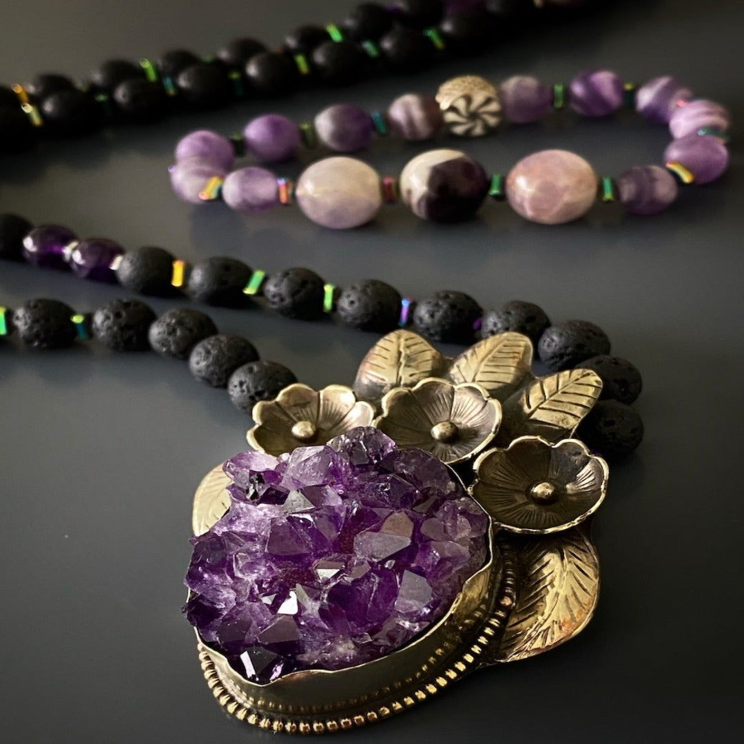 Necklace showcasing the beauty and spiritual energy of amethyst and lava rock stones.