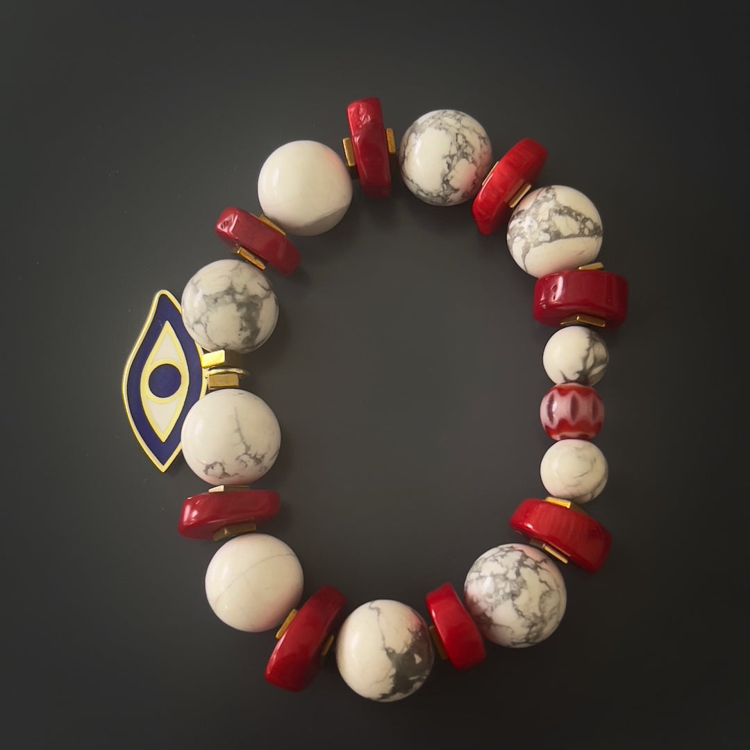 Feel the positive vibes of the Spiritual Beads Evil Eye Bracelet, adorned with beautiful stones and a protective charm.
