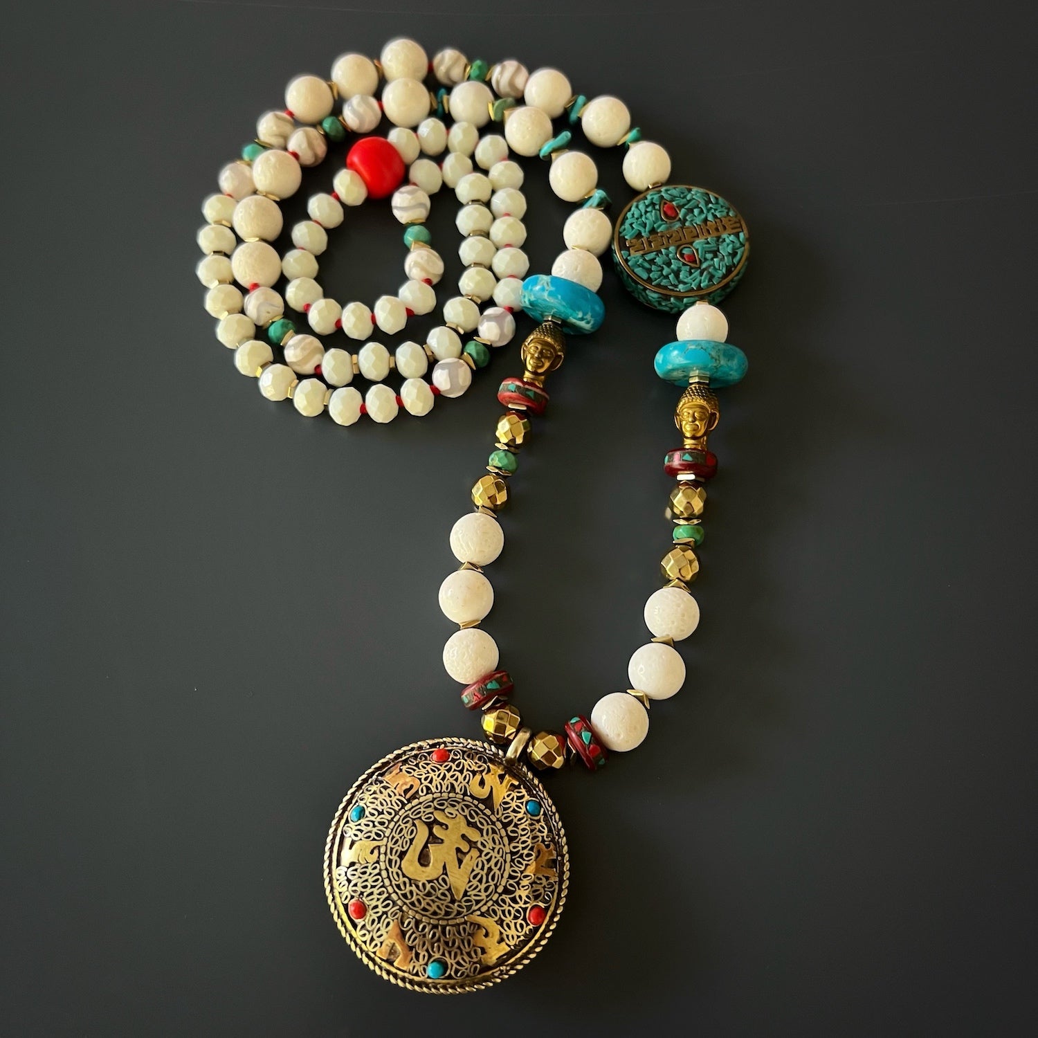 Radiate Peace: Natural stones and the powerful mantra on the Spiritual Buddha Mantra Necklace.