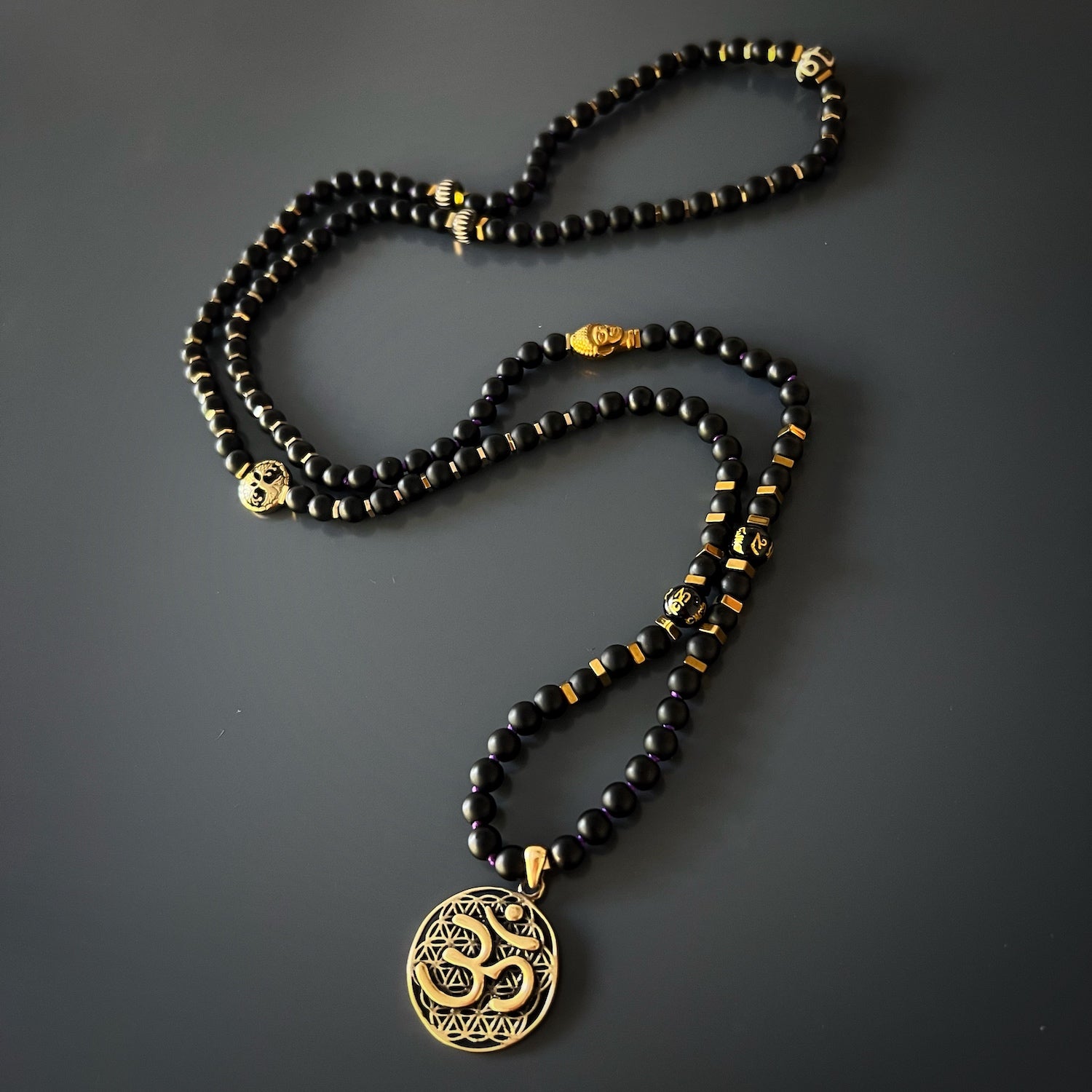 The Spiritual Yoga Mala Onyx Necklace, radiating a sense of spirituality