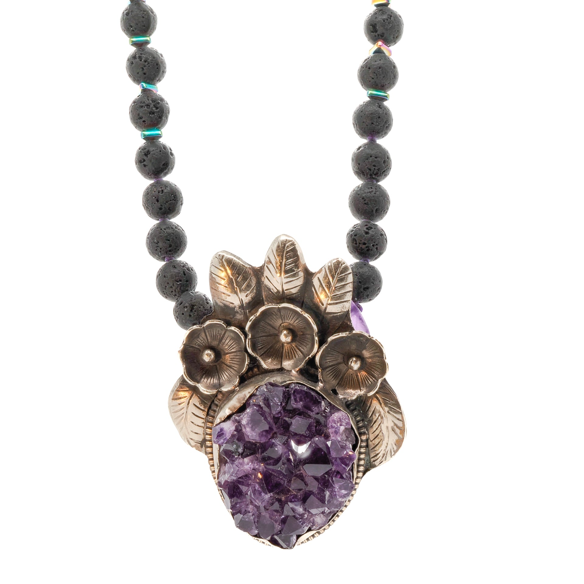 Spiritual Amethyst Necklace showcasing a beautiful flower silver pendant with an amethyst row stone.