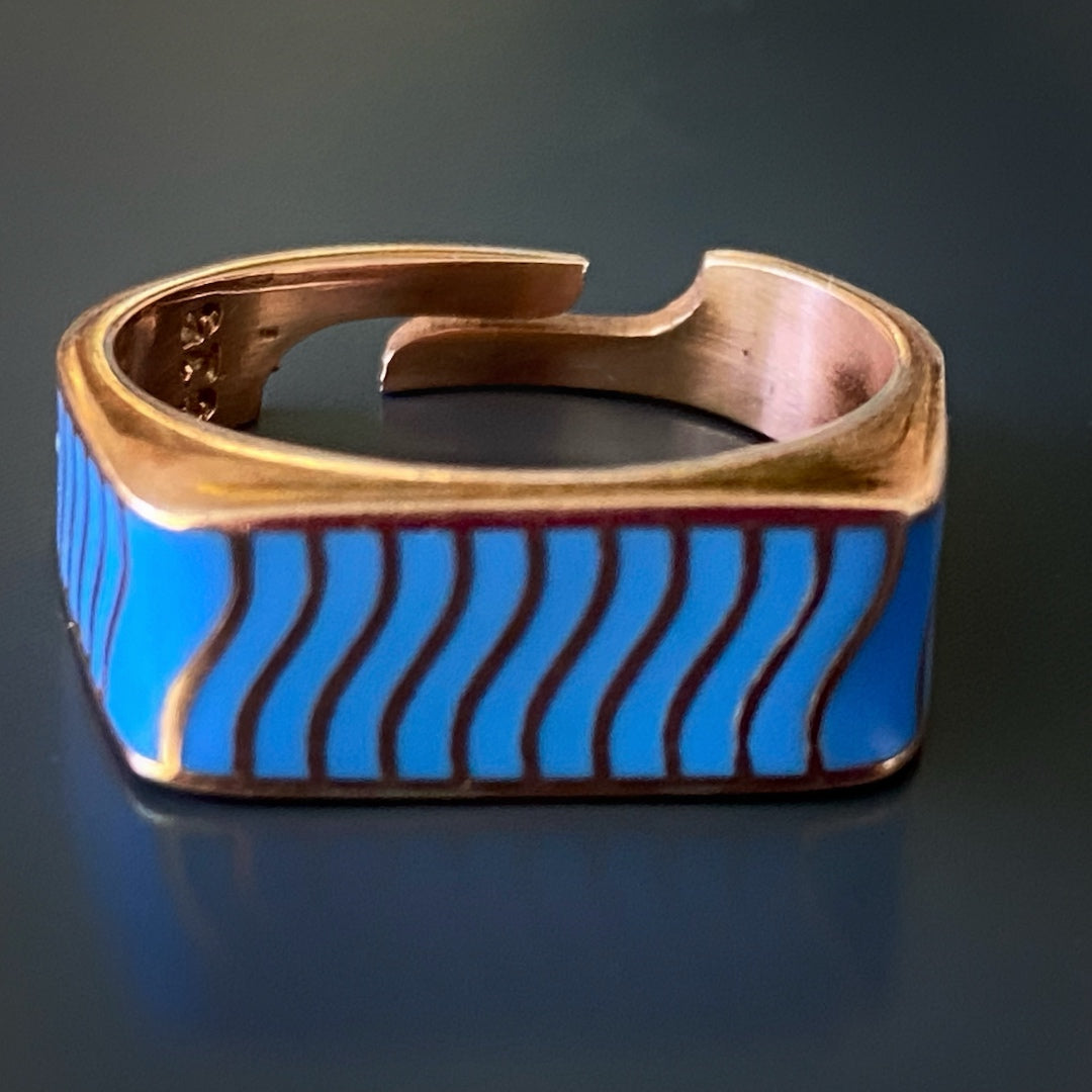 Captivating Blue - The ring features a beautiful enamel design.