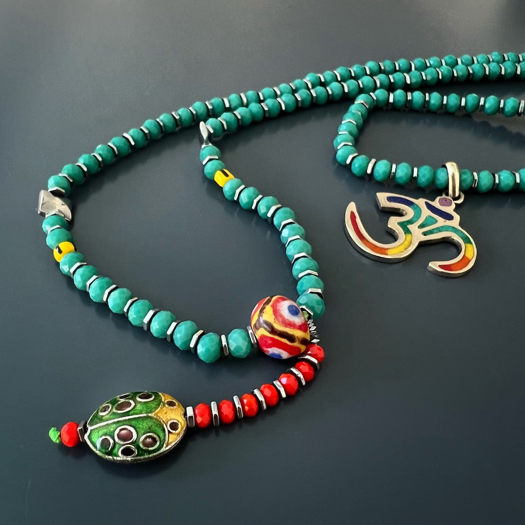 Handmade Summer Vibes Yogi Necklace with vibrant crystal and African bead accents.