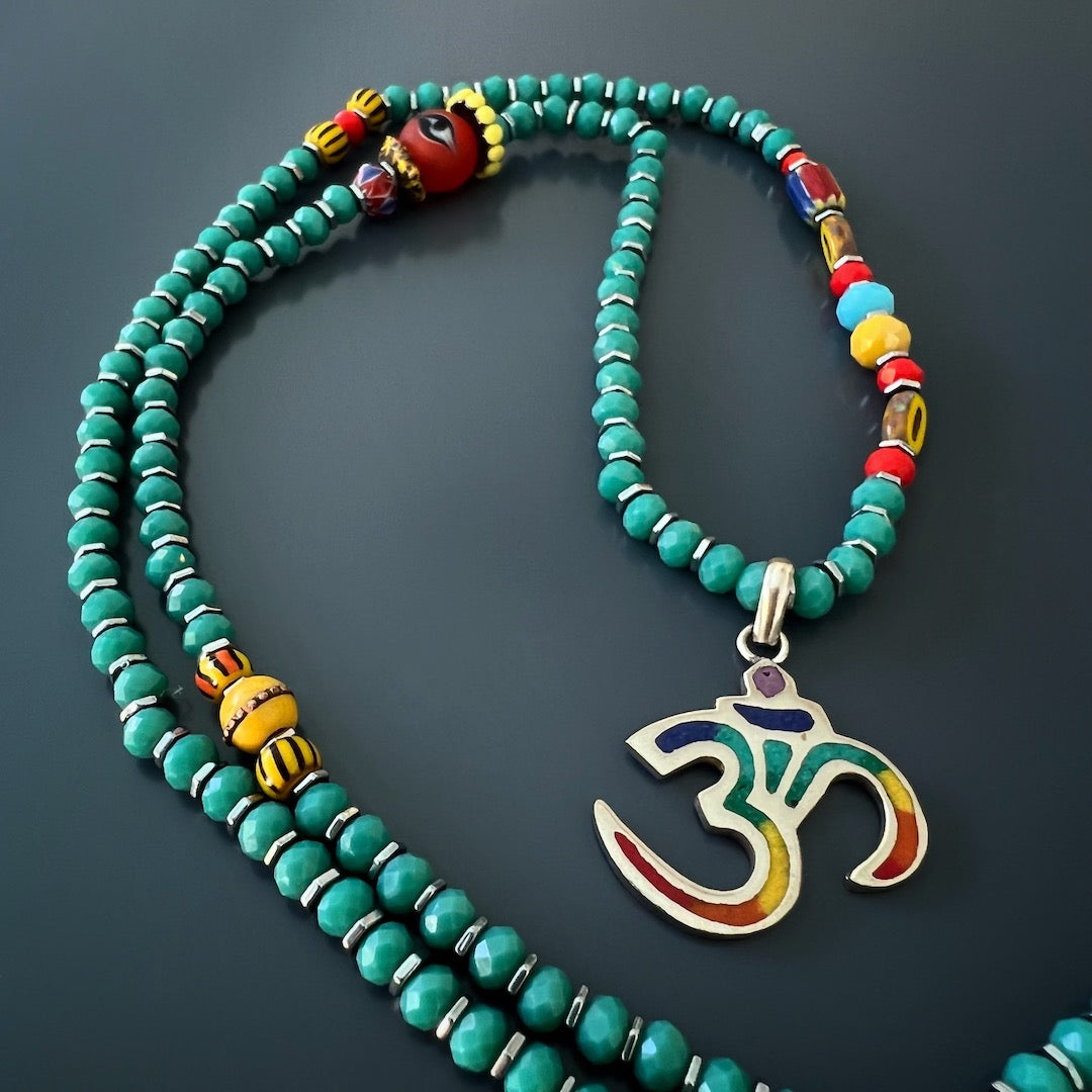 Unique Summer Vibes Yogi Necklace featuring a colorful Om pendant and lucky ladybug charm.