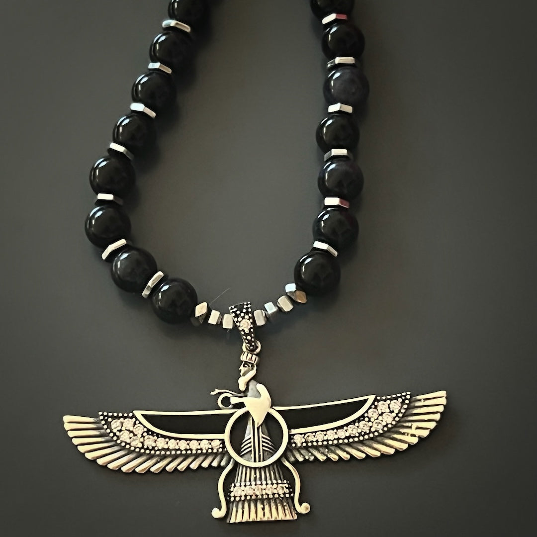 Stylish Symbolism - The Tourmaline Faravahar Necklace Embodies Beauty and Spiritual Significance.
