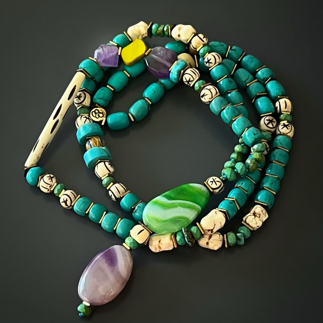 Stylish Simplicity - The Handmade Necklace Features Turquoise Stone Beads with a Gold Hematite Spacer.