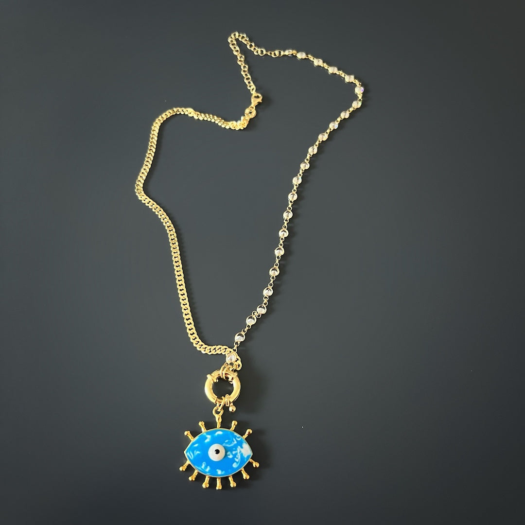 The Turquoise Evil Eye Chain Necklace, a timeless and versatile piece that can be worn for various occasions.