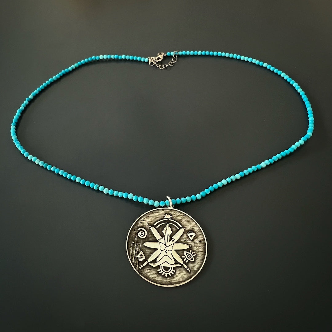 Handcrafted Turquoise See The Good Necklace - Express your optimism with this unique piece.