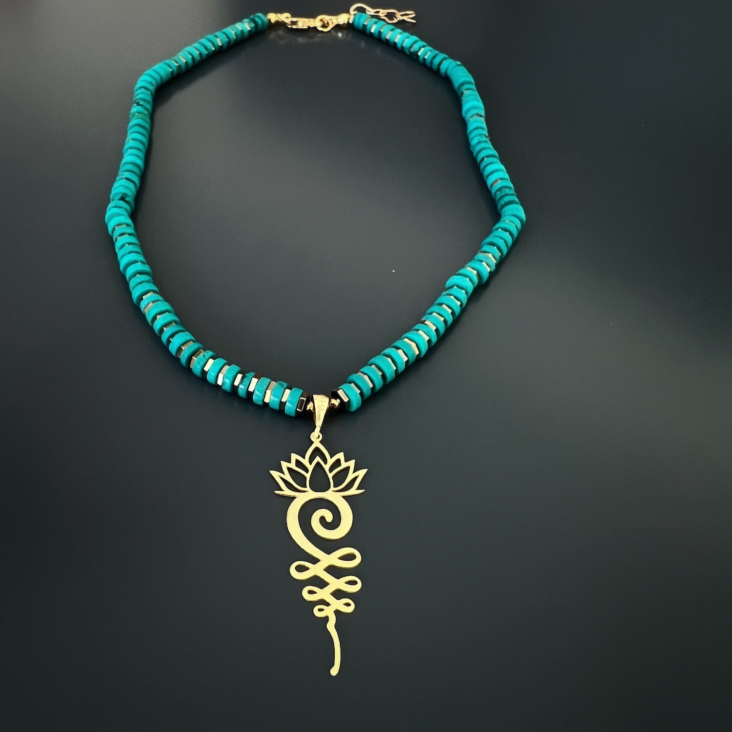 The Turquoise Unalome Serenity Necklace, showcasing its unique design