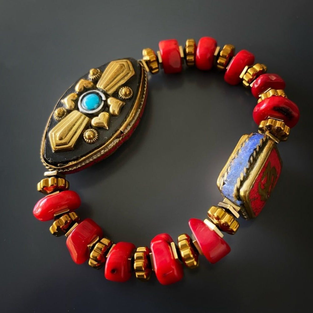 Explore the vibrant and meaningful Vintage Style Ethnic Om Bracelet, crafted with red coral beads and a Nepal-inspired charm.