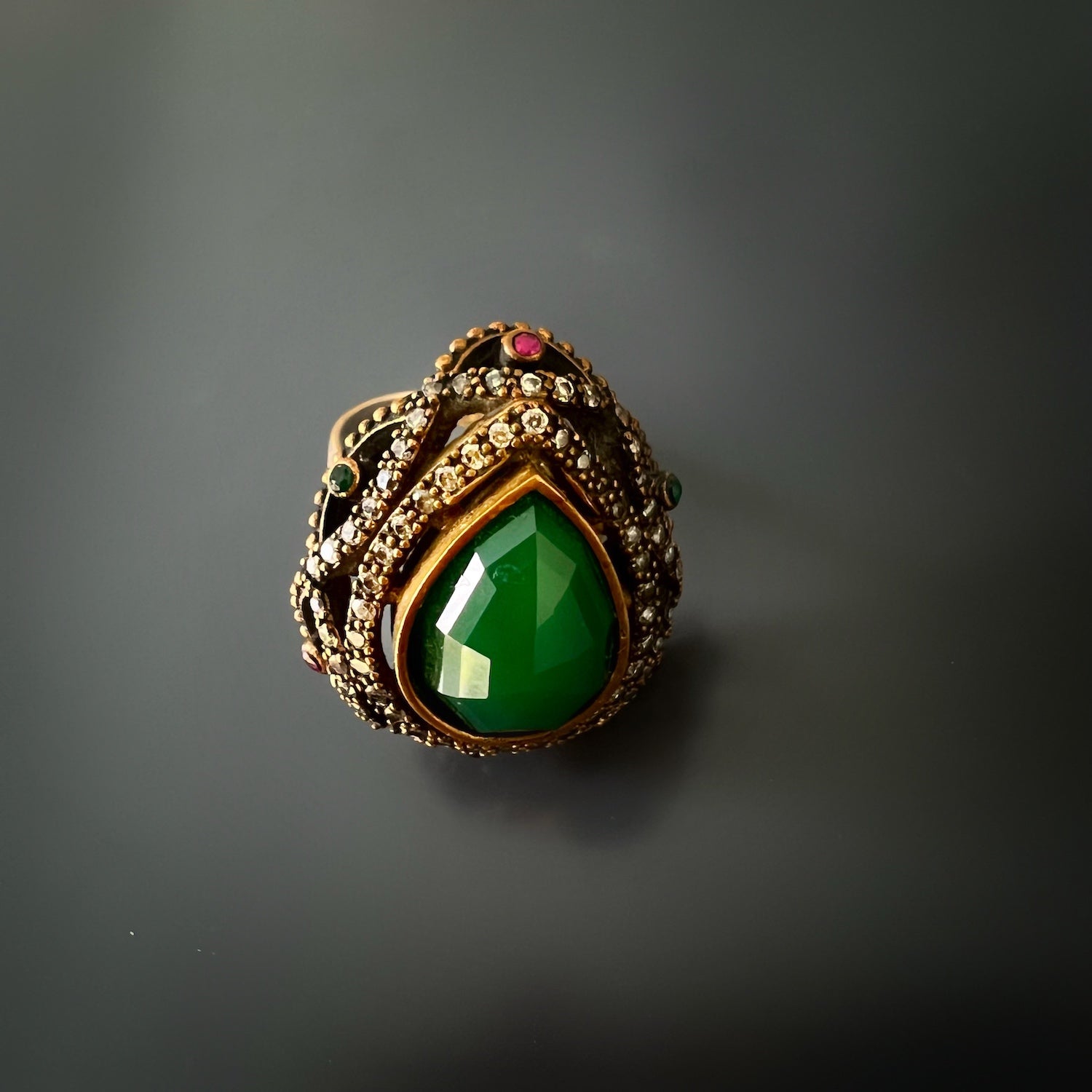 Unique Jade Stone - A one-of-a-kind ring with distinctive natural patterns.