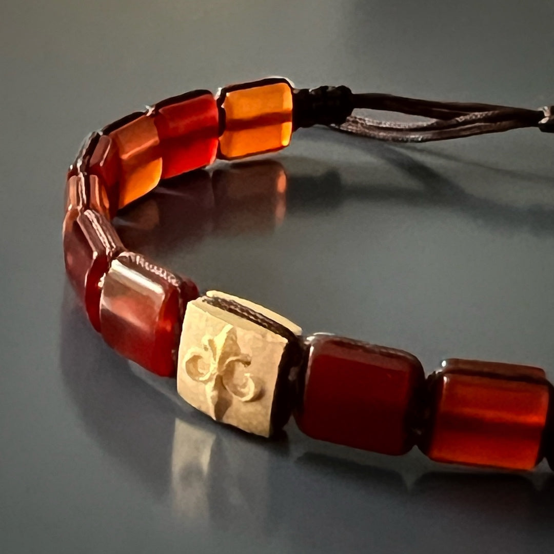 Symbol of Purity and Honor - Woven Agate Gold Fleur De Li Bracelet, a treasured keepsake.