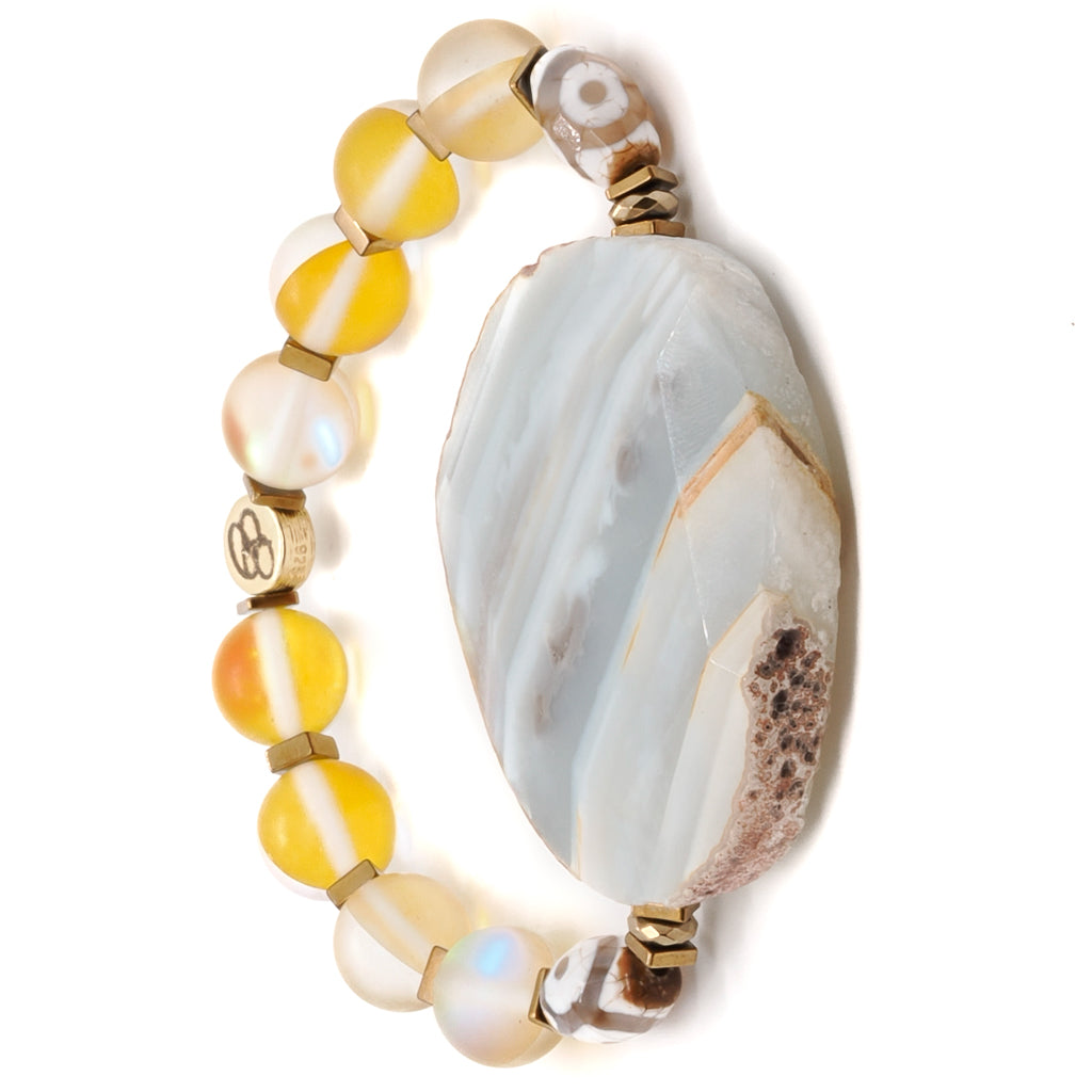 Elevate your style with the Yellow Chunky Agate Bracelet, adorned with a large Agate stone and Nepal eye beads for a touch of sophistication.