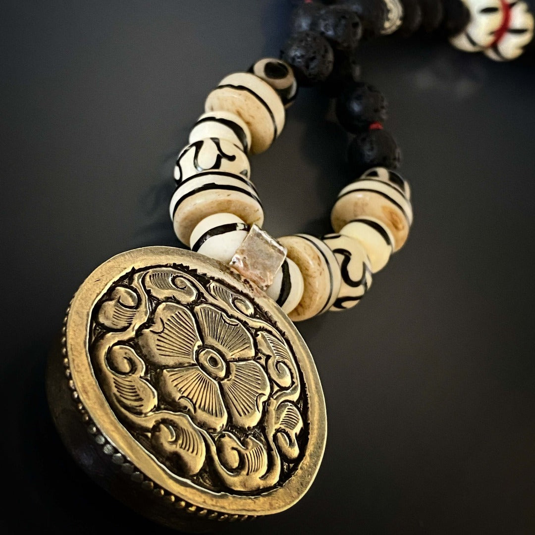 Unique Yin Yang Balance Necklace, adorned with intricate Nepal silver and bone pendant, a symbol of unity and equilibrium.