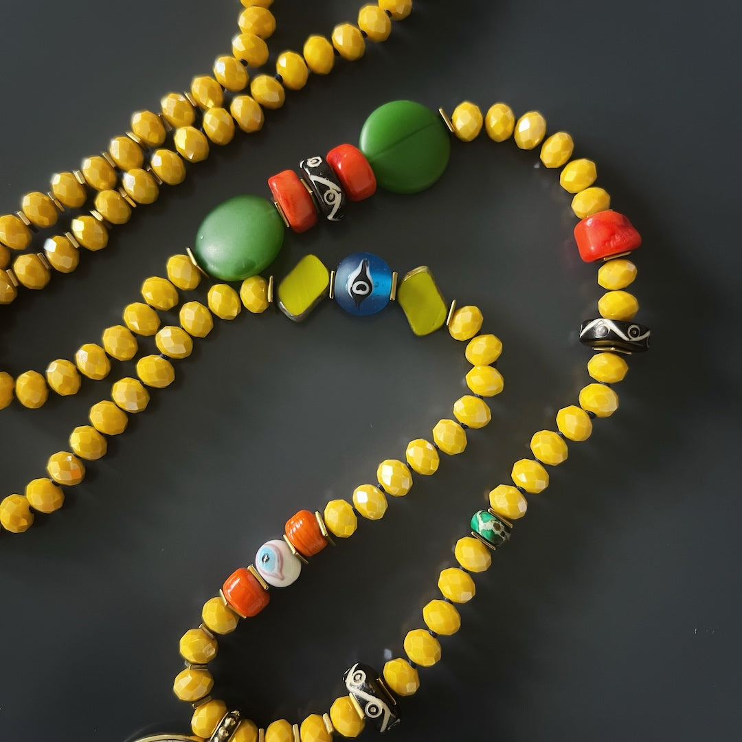 Embrace the vibrancy and spiritual significance of the Yoga Serenity Necklace, a true expression of individuality.