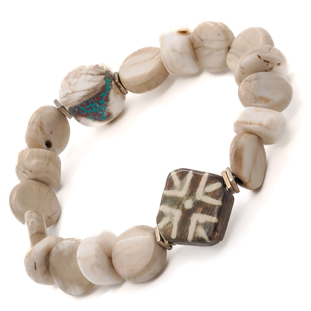 Versatile African Bone Beads bracelet with cream-colored African seed beads and handmade white and green Nepal bead, great for any occasion