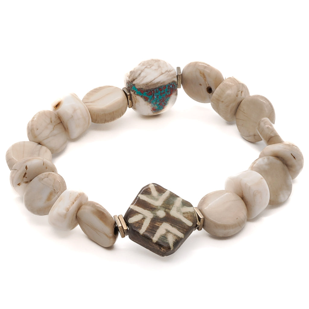 Elegant African Bone Beads bracelet with cream-colored African seed beads and a lovely Nepal bead, perfect for a subtle and sophisticated look