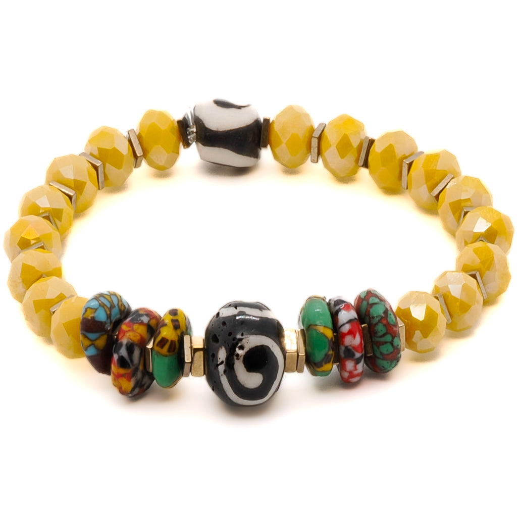 A close-up photo of the African Yellow Women Bracelet, showcasing its beautiful yellow crystal beads and spiral and eye Nepal beads.