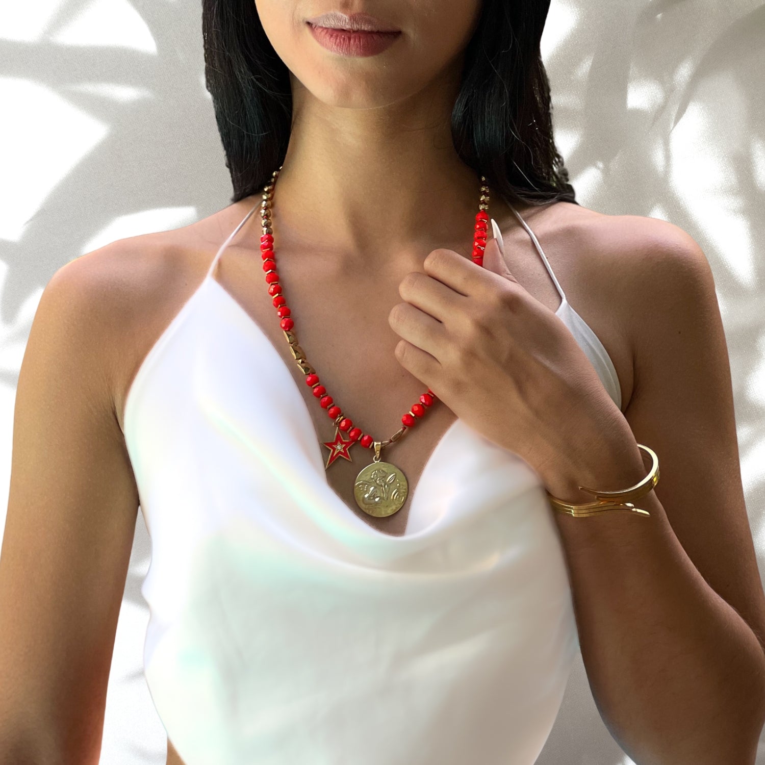 Model wearing the Angel Protector Necklace, a stunning accessory that reminds us we are never alone