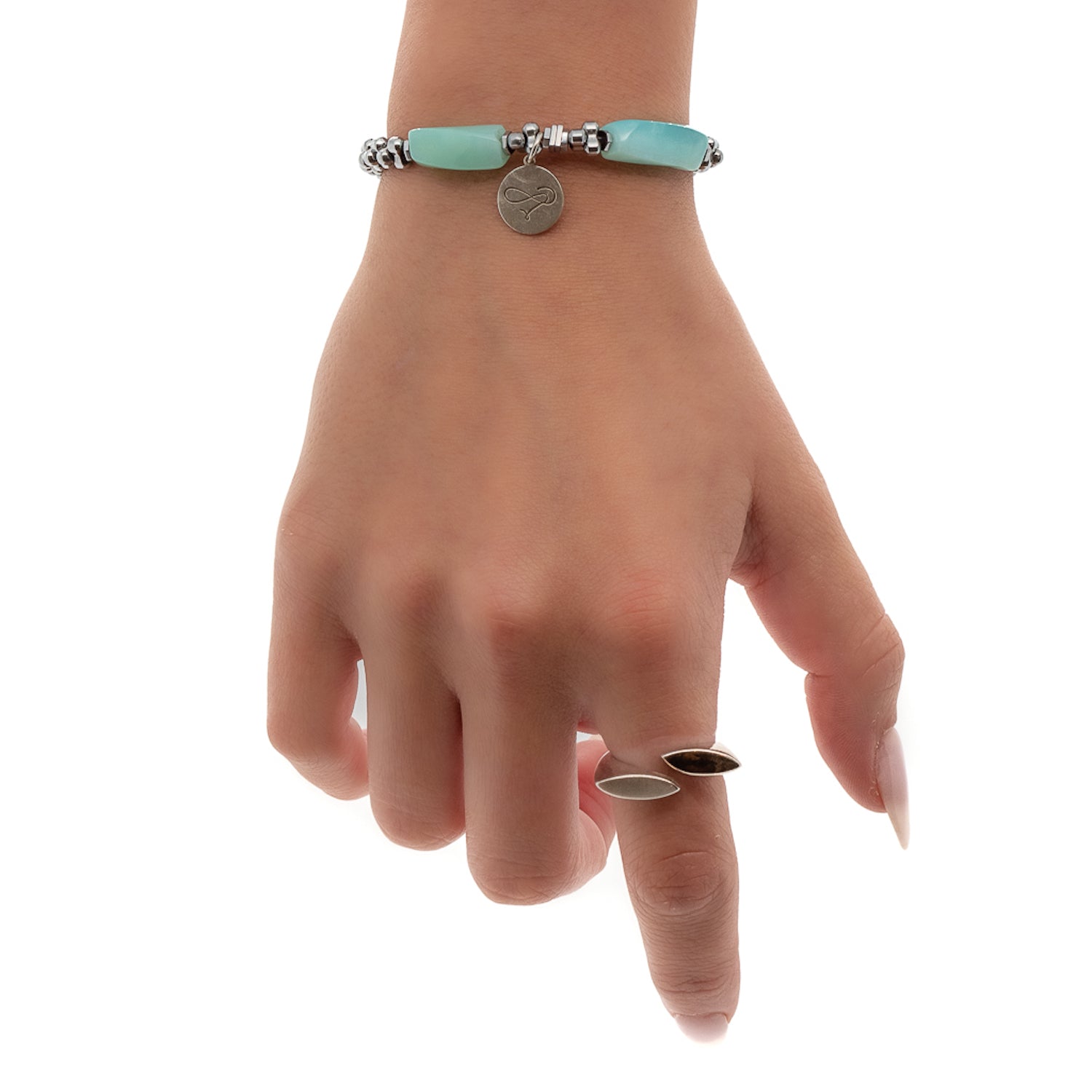 Hand Model Wearing Aquamarine Love Bracelet with Protective Hematite Stones