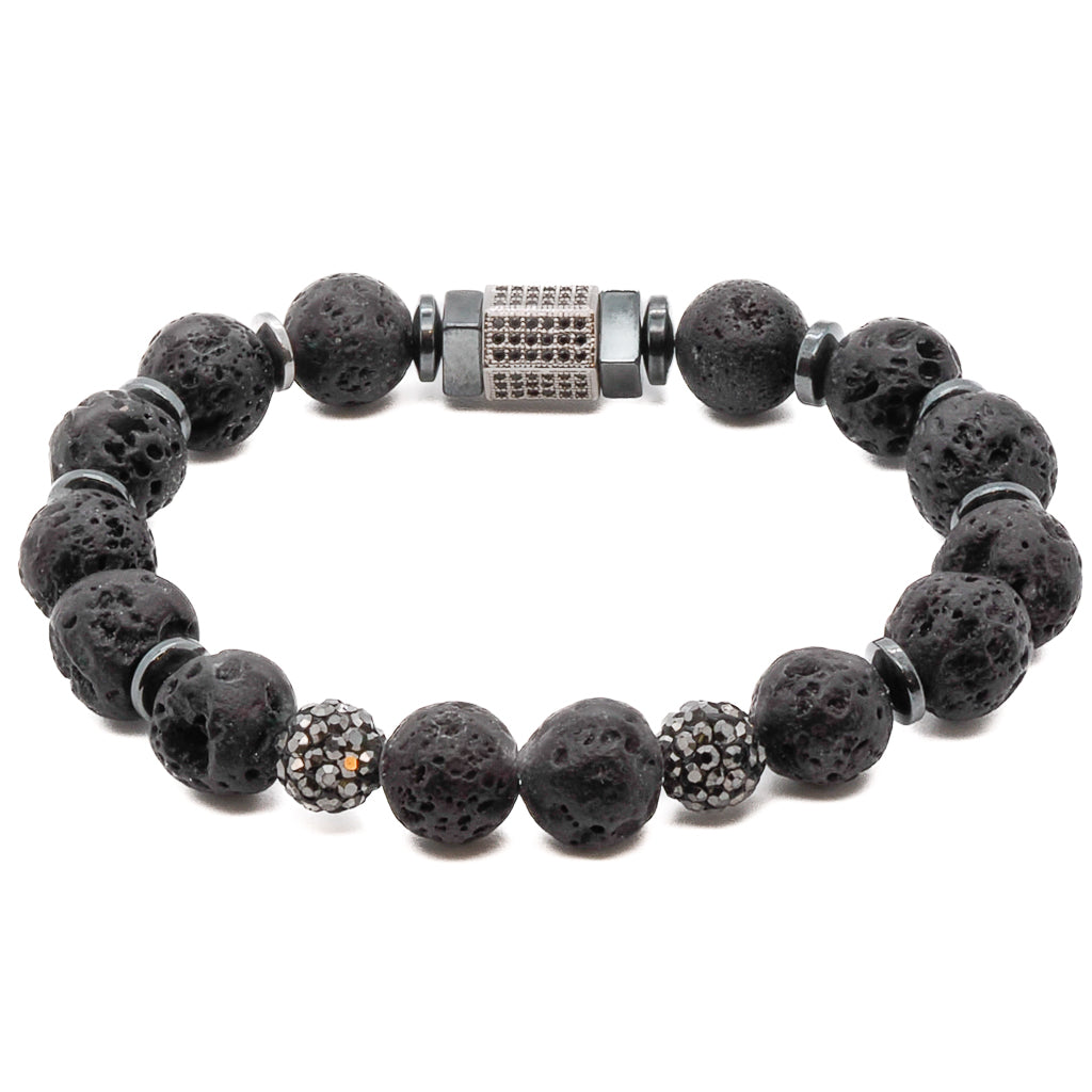 The Black Crystal Bracelet is a stunning and versatile piece that combines the natural beauty of black lava rock and crystal beads with a touch of elegance from the Swarovski charm.