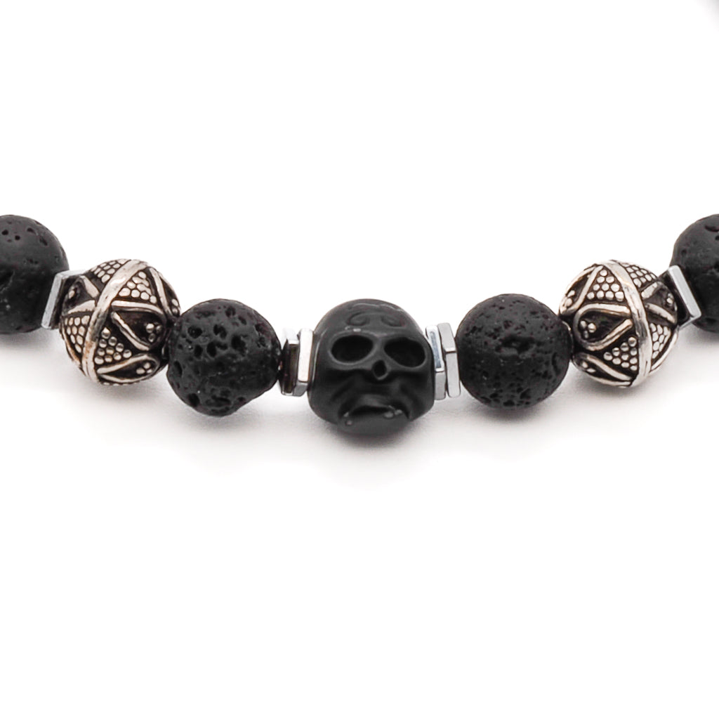 The black skull centerpiece adds a unique and striking touch to the overall design.