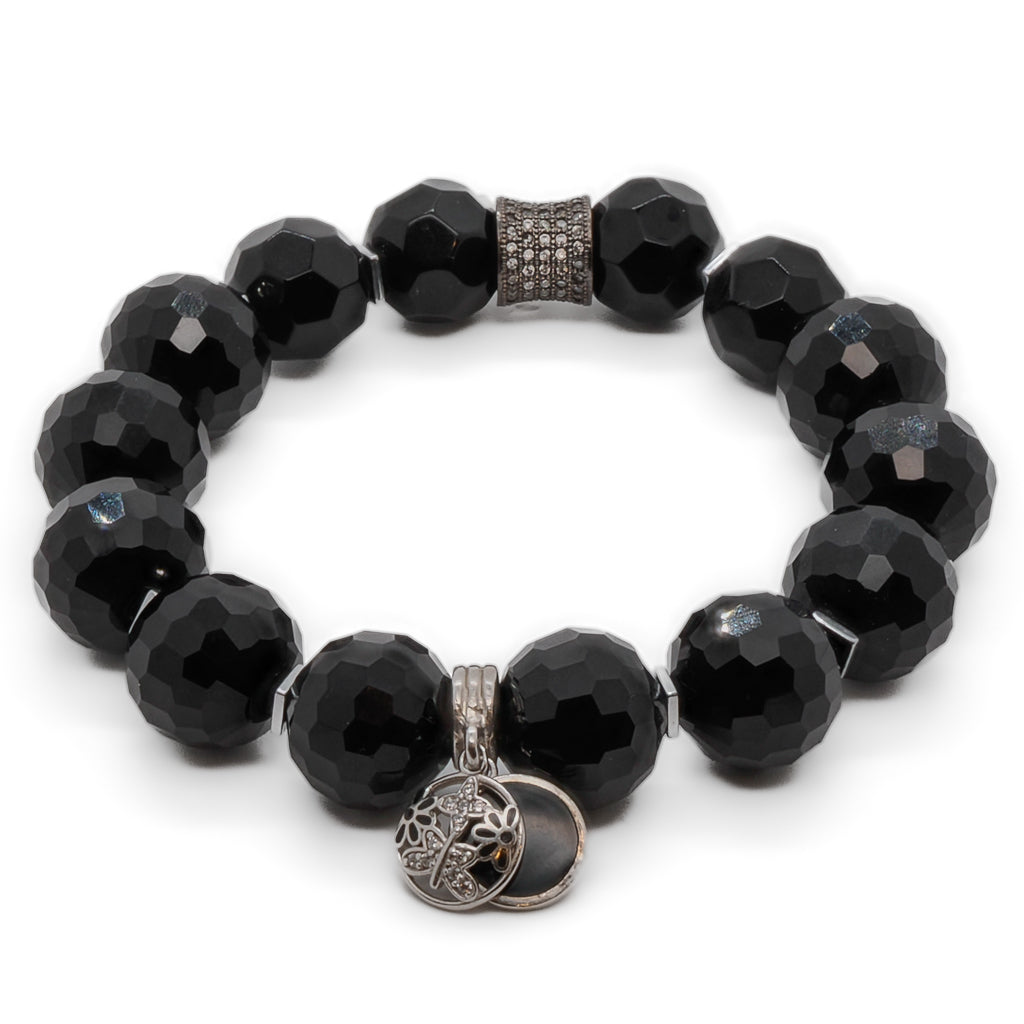 Accessorize with meaning: Black Protection Bracelet featuring a silver butterfly charm