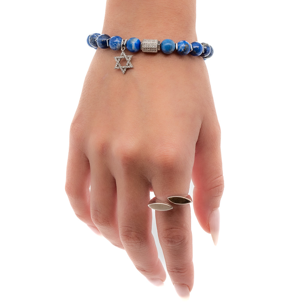 Elegant Bracelet on Hand Model Featuring Lapis Lazuli and Symbolic Star of David