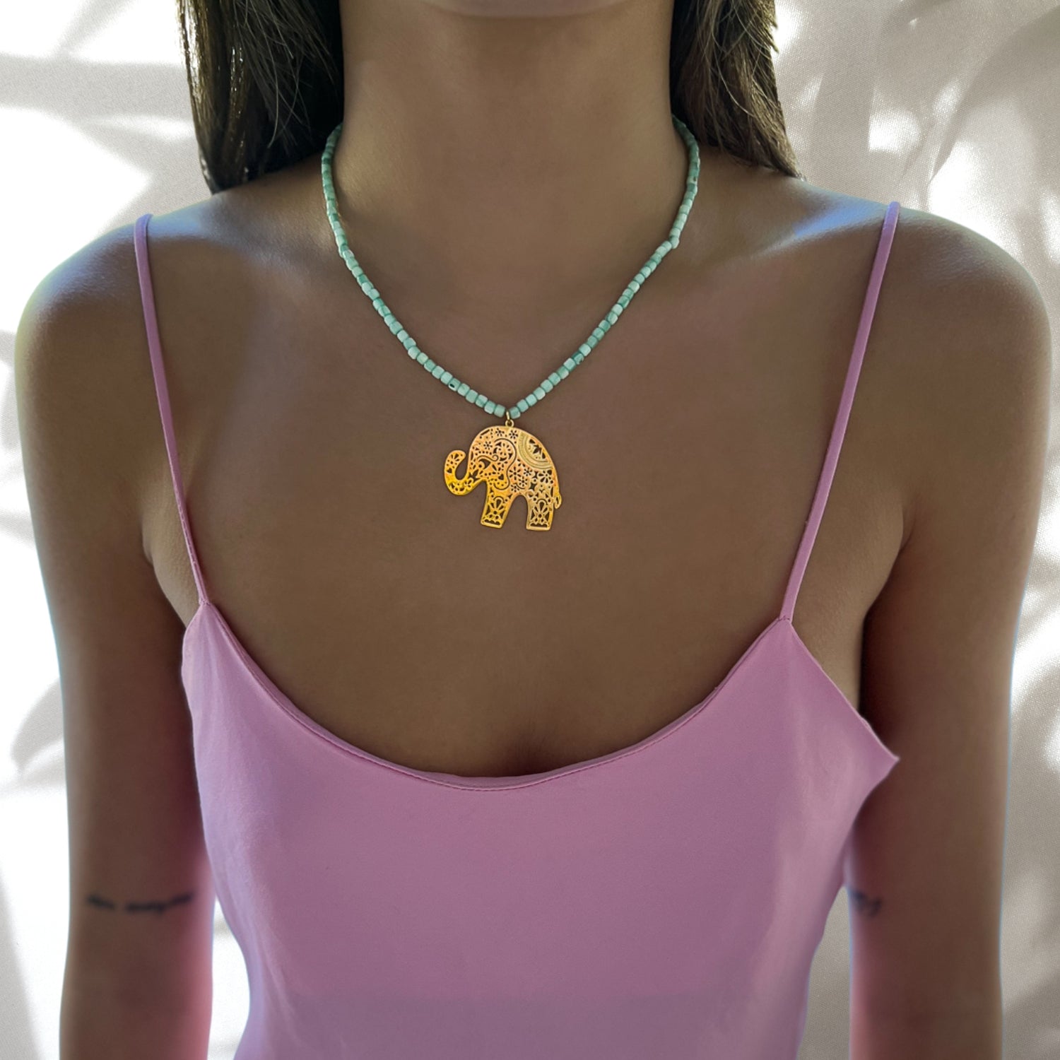 Model wearing Bohemian Elephant Necklace for a Fashionable and Meaningful Look
